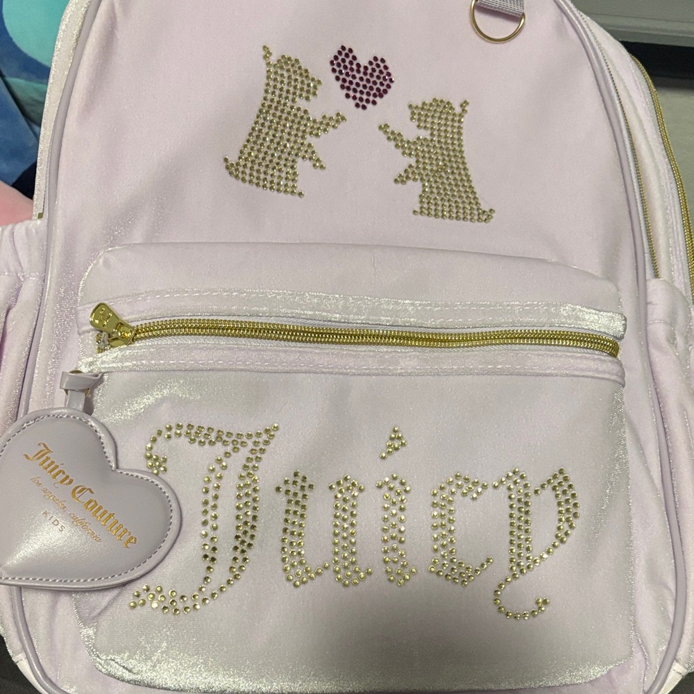 Juicy Couture Light Purple Backpack with Gold Accents